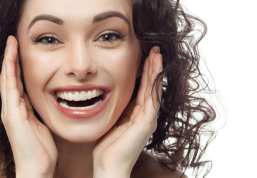 Woman with veneers smiling.